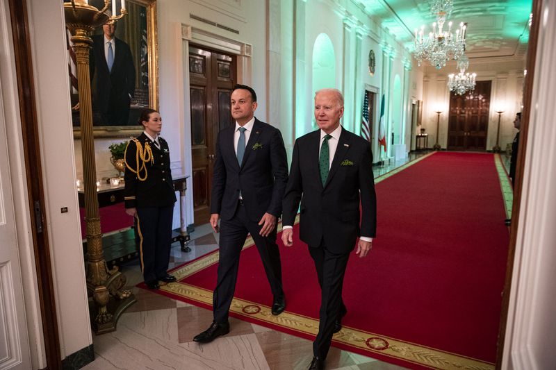 Leo Varadkar, Taoiseach of Ireland, arrives with President Joe Biden for a St. Patrick's Day reception in the East Room of the White House in Washington, March 17, 2023. Biden is traveling to Northern Ireland today before touring the Republic of Ireland. (Al Drago/The New York Times)
                      