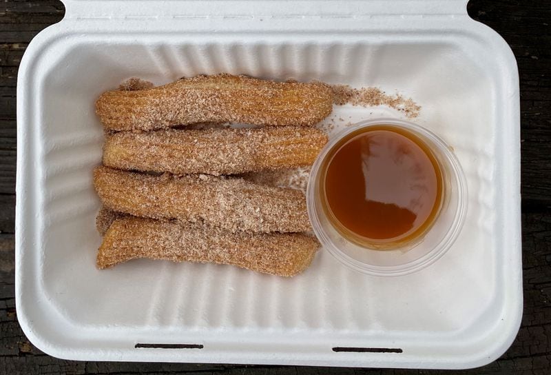 Churros are available from the Queso Truck. Wendell Brock for The Atlanta Journal-Constitution