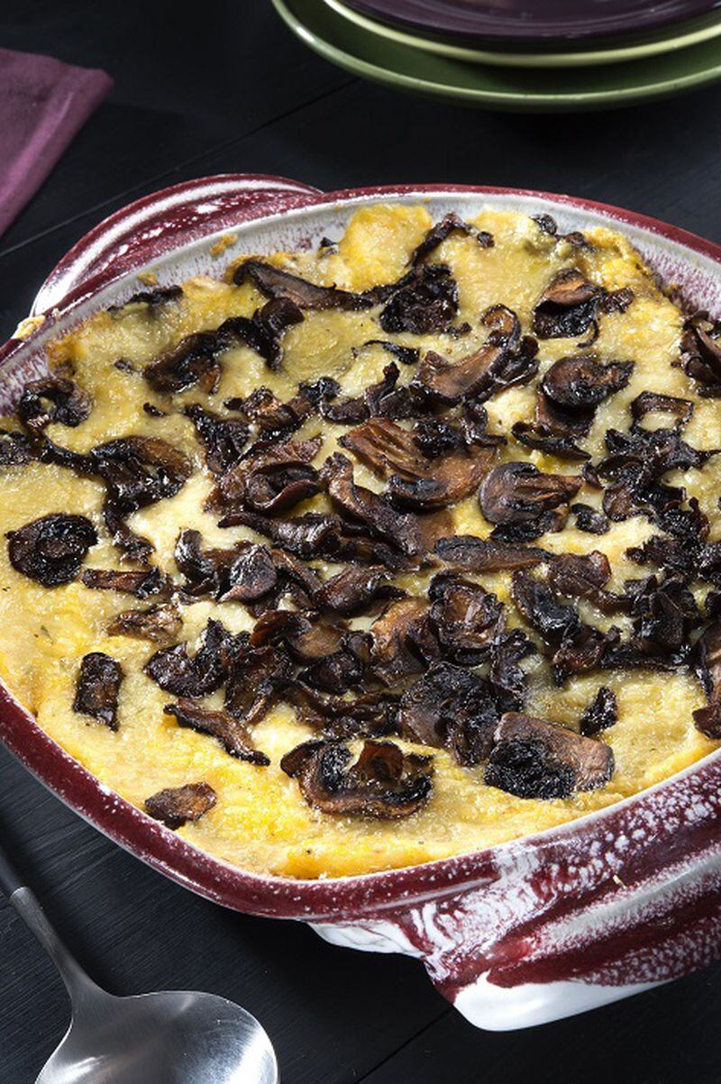 Rustic cheese baked polenta with wild mushrooms. (Tammy Ljungblad/Kansas City Star/TNS)