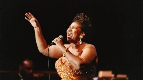 Aretha Franklin performs at Chastain Park Amphitheatre in 1993.