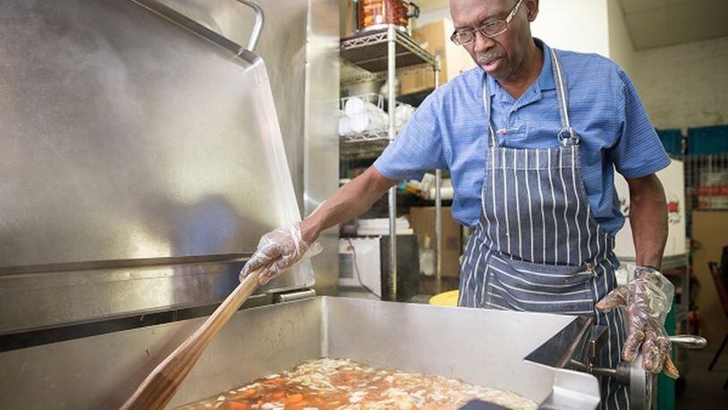 For three decades, Clyde Corbin has managed the Crossroads Community Ministries kitchen that provides food to grownups and children who are homeless. EZRA MILLSTEIN