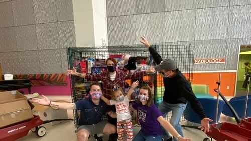Teddy and Farrah Welsh, with their 4-year-old Everly, donated more than 500 toys to Scottish Rite Children's Hospital.