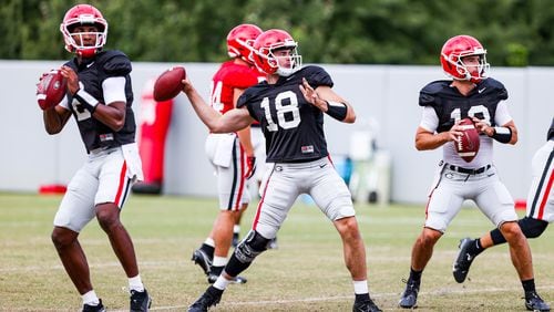 Georgia quarterback D'Wan Mathis (2), Georgia quarterback JT Daniels (18), Georgia quarterback Stetson Bennett (13) during the Bulldogs’ practice session in Athens, Ga., on Monday, Sept. 21, 2020. (Photo by Tony Walsh)