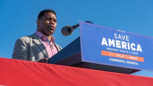 Former Heisman Trophy winner and Republican candidate for U.S. Senate Herschel Walker speaks to supporters of former U.S. President Donald Trump during a rally at the Banks County Dragway on March 26, 2022, in Commerce, Georgia.  (Megan Varner/Getty Images/TNS)