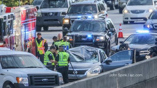 A driver was killed Thursday when a tire from a truck flew into the person's car on Ga. 400 in Sandy Springs, police said.