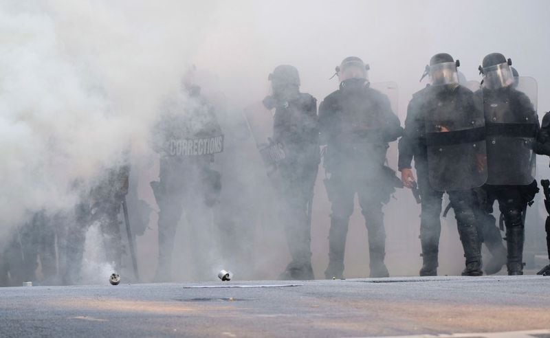 Tear gas fills the air as police brace for another night of protests in Atlanta.