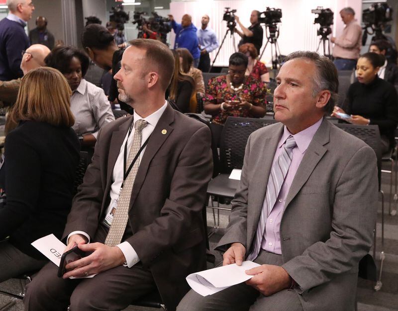 Fulton County Schools Superintendent Mike Looney (right) sits next to Chief Operations Officer Patrick Burke during a a March 9, 2020, press conference announcing school closures due to COVID-19. Curtis Compton/ AJC FILE PHOTO