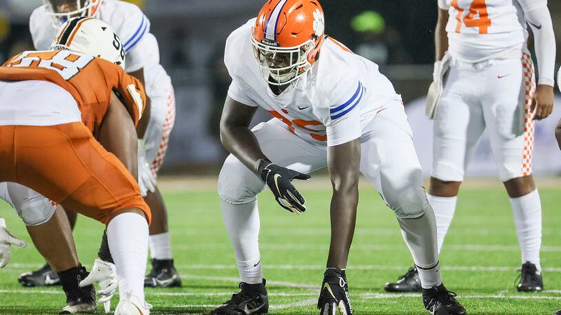 Parkview offensive lineman Jordan Floyd (75, center) prepares for an offensive snap during their game against Kell in the 2023 Corky Kell + Dave Hunter Classic at Kell High School, Wednesday, August 16, 2023, in Marietta, Ga. Floyd is a Georgia Tech commitment. (Jason Getz / Jason.Getz@ajc.com)