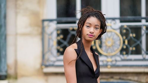 Willow Smith, daughter of Will Smith and Jada Pinkett Smith, practices polyamory. It means she’s open with partners about her other relationships but isn’t monogamous to just one. (Photo by Edward Berthelot/ for Christian Dior)