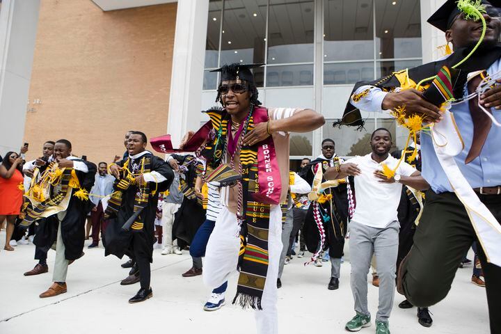 Members of Alpha Phi Alpha fraternity perform a step routine after the Morehouse College commencement ceremony on Sunday, May 21, 2023, on Century Campus in Atlanta. The graduation marked Morehouse College's 139th commencement program. CHRISTINA MATACOTTA FOR THE ATLANTA JOURNAL-CONSTITUTION