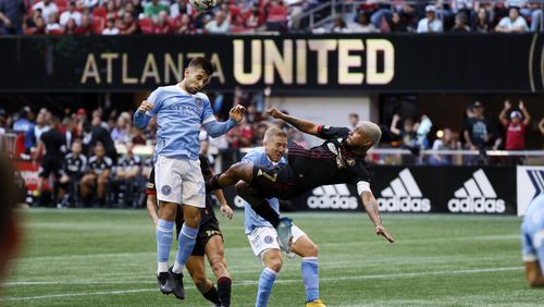 Atlanta United forward Josef Martinez tried to connect the ball with a bicycle kick during the second half at Mercedes-Benz Stadium on Sunday. Miguel Martinez / miguel.martinezjimenez@ajc.com
