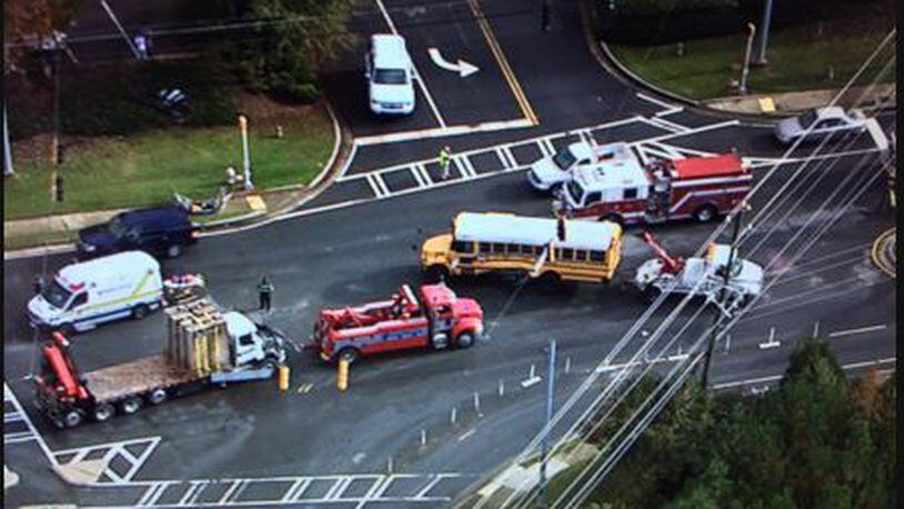 A Fulton County school bus was involved in a crash on Jones Bridge Road at Douglas Road in Johns Creek on Friday, Nov. 6, 2015. (Channel 2 Action News)