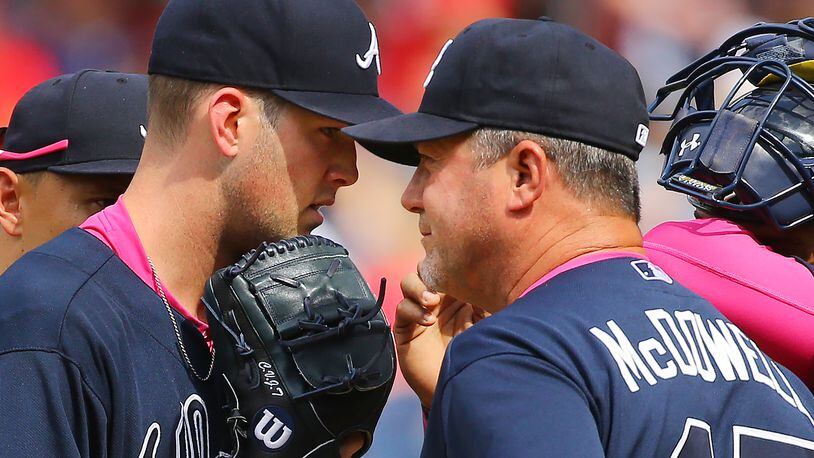 Braves starting pitcher Alex Wood gets a visit on the mound from pitching coach Roger McDowell in the 7th inning against the Nationals during a baseball game on Sunday, May 10, 2015, at Nationals Park in Washington, D.C. Curtis Compton / ccompton@ajc.com