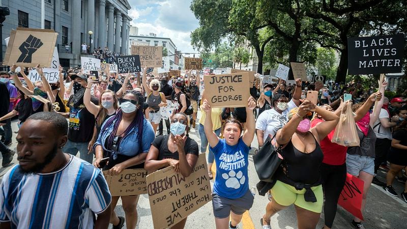 SAVANNAH, GA - MAY 31, 2020: Nearly a 1,000 protesters chant for justice for George Floyd during a peaceful rally and march in the Historic District of downtown Savannah Saturday. (AJC Photo/Stephen B. Morton)