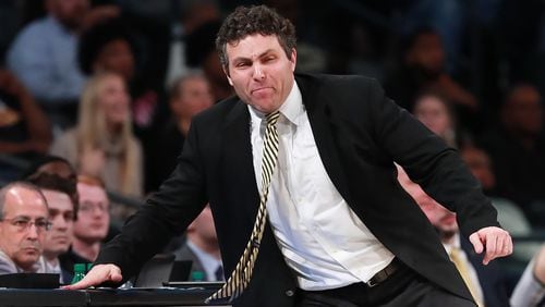 Georgia Tech head coach Josh Pastner bangs on the scorers table trying to get his team's attention during a 78-74 loss to Notre Dame Wednesday, Jan. 15, 2020, at McCamish Pavilion in Atlanta.