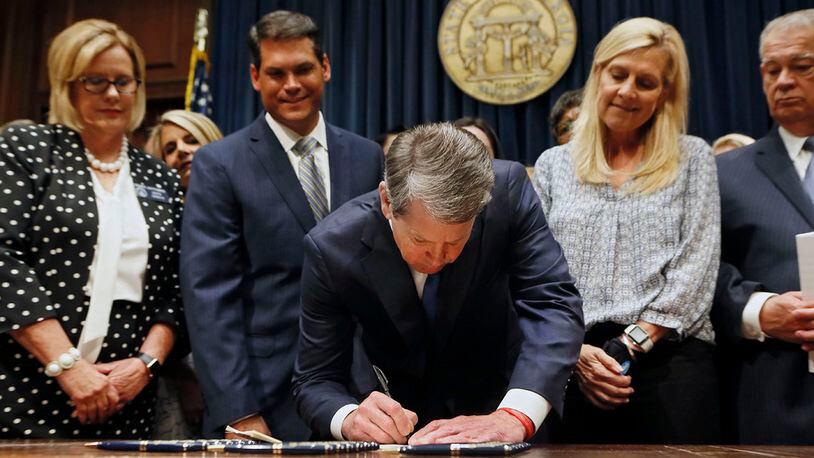Gov. Brian Kemp signed HB 481, the "heartbeat bill," on May 7, 2019. The bill outlaws most abortions once a doctor can detect a fetus' heartbeat - usually around six weeks of pregnancy.  The restrictive abortion law went into effect in July after the U.S. Supreme Court overturned Roe v. Wade, the landmark ruling that granted the constitutional right to abortion. Bob Andres / bandres@ajc.com