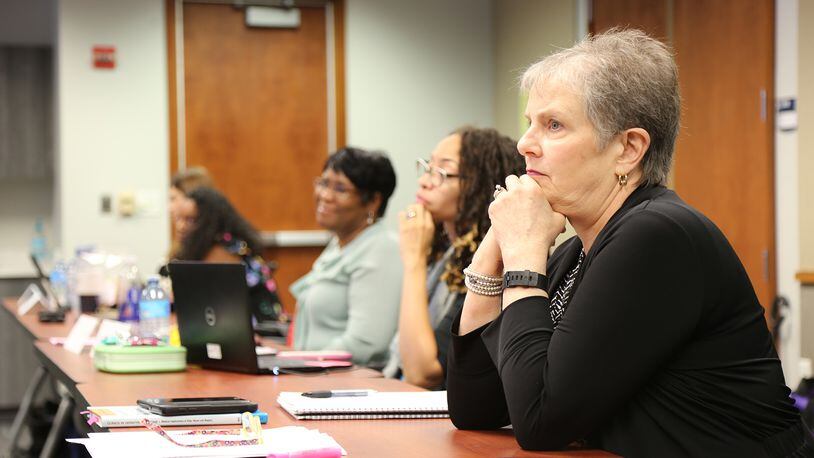 Pat King, a forensics nurse who was one of the leading experts in Georgia on elder abuse and neglect, reviews a training class at the GBI July 10, 2019. King, who worked in the Department of Human Services, is credited with helping to transform Georgia law to help make it easier to prosecute elder abuse cases. (Tyson Horne / Tyson.Horne@ajc.com)