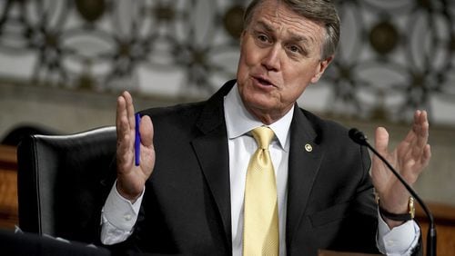 Sen. David Perdue, R-Ga., asks questions during the Senate Armed Services Committee hearing on the Department of Defense Spectrum Policy and the Impact of the Federal Communications Commission’s Ligado Decision on National Security during the COVID-19 coronavirus pandemic on Capitol Hill in Washington, Wednesday, May 6, 2020. (Greg Nash/Pool via AP)