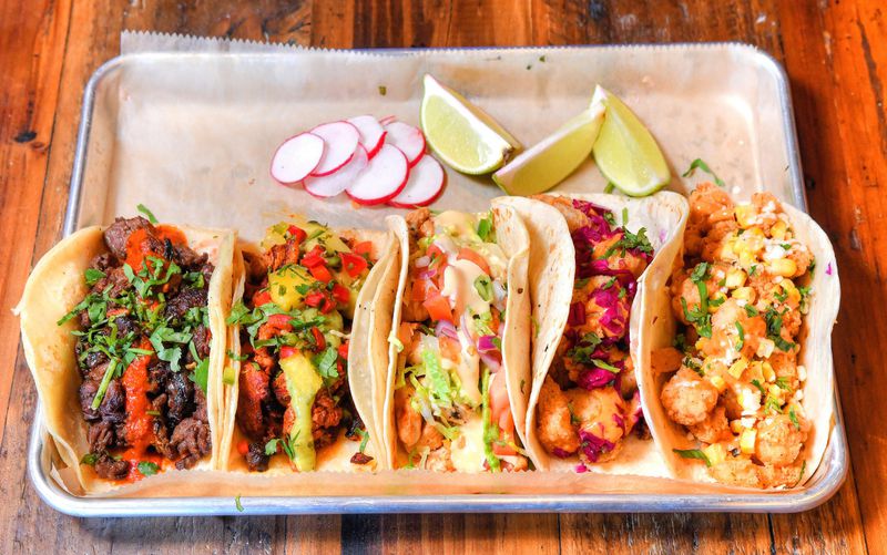 Carne Asada, Al Pastor, Grilled Chicken, Fried Catfish, and Fried Shrimp tacos at Lazy Llama Cantina. CONTRIBUTED BY CHRIS HUNT PHOTOGRAPHY