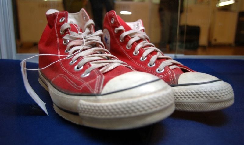 Converse All Stars trainers worn by Keith Moon of The Who are displayed at Christies before auction on April 26, 2007, in London, England.
