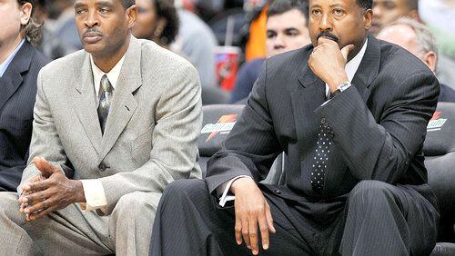 Larry Drew (left) and Mike Woodson during happier times. (Rich Addicks/AJC)