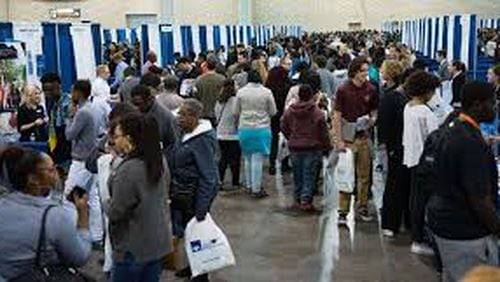Students attend a college fair in Atlanta. U.S. News & World Report released its annual college rankings, which many schools use to recruit prospective students.