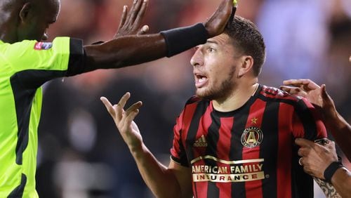 Atlanta United midfielder Eric Remedi argues a call with an official while playing C.S. Herediano in their Concacaf Champions League soccer match on Thursday, Feb. 28, 2019, in Kennesaw.    Curtis Compton/ccompton@ajc.com
