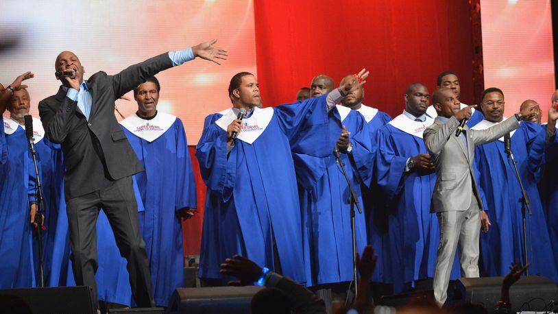 Members of the NFL Players Choir perform with Donnie McClurkin and with Kirk Franklin. CONTRIBUTED