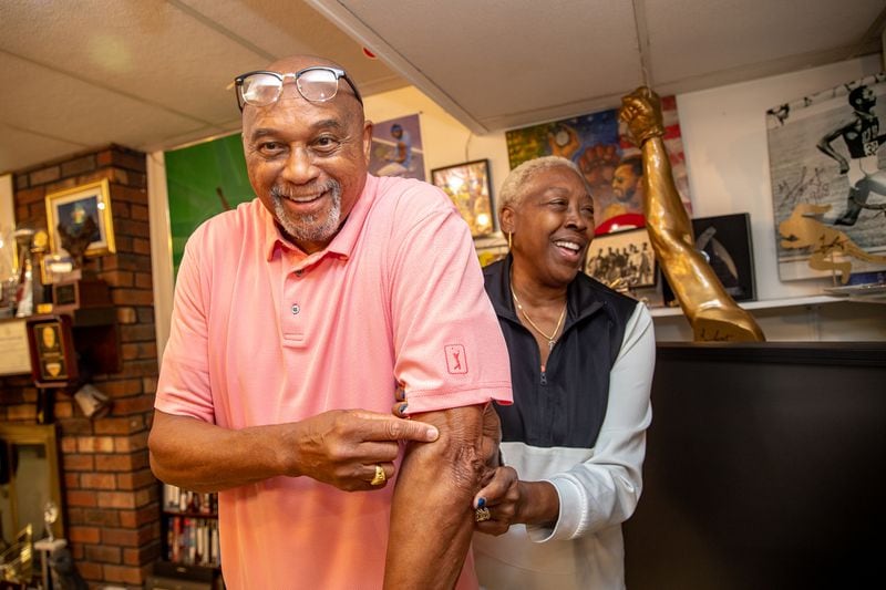 Gold medalist Tommie Smith won the 200-meter in the 1968 Olympic Games, but doesn't sprint these days. Instead, at age 78 he stays in shape through low-impact exercise and the steady encouragement of his wife and agent, Delois. "She keeps me on a rigid schedule," said Smith. "We  walk every day, and we frequently walk up Stone Mountain." The granite peak is only minutes from the Smiths' Stone Mountain home. (Jenni Girtman for The Atlanta Journal-Constitution)