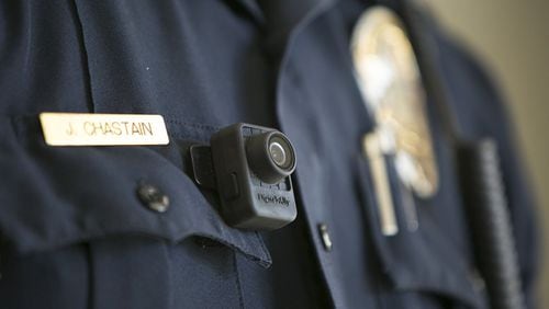Roswell has agreed to pay $146,998 the first year and $58,933 in each of years two through five to equip 155 sworn police officers with body-worn cameras. AJC FILE