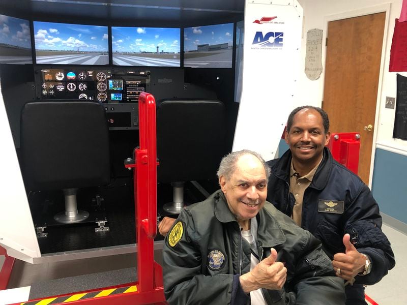 Julius Alexander started ACE in a trailer in 1980 at Fulton County Airport, aka Charlie Brown Field offering Saturday classes for a dozen students for $12 per month. He is with his son Patrick who now runs the nonprofit. 
