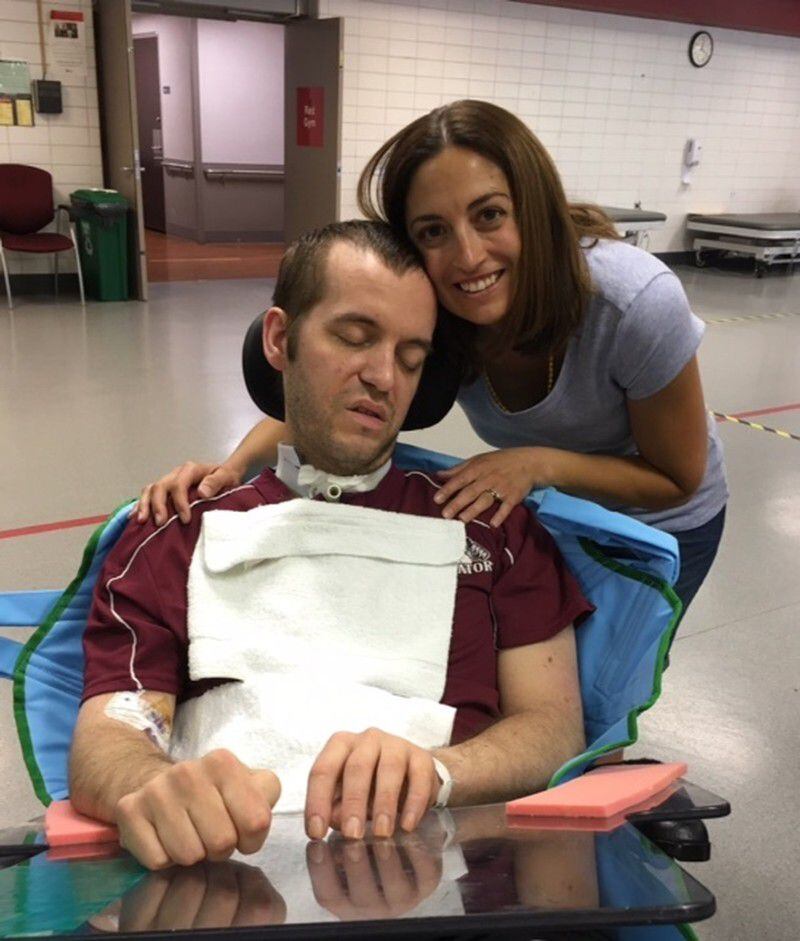Zach Lawrence and his wife, Meghan, at a rehabilitation center at Ohio State University. (Photo contributed by family)