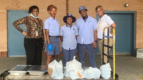 In May, a group of Brookhaven residents purchased 100 meals and donated them to U.S. Postal Service workers in Brookhaven. Courtesy of Matt Gunter