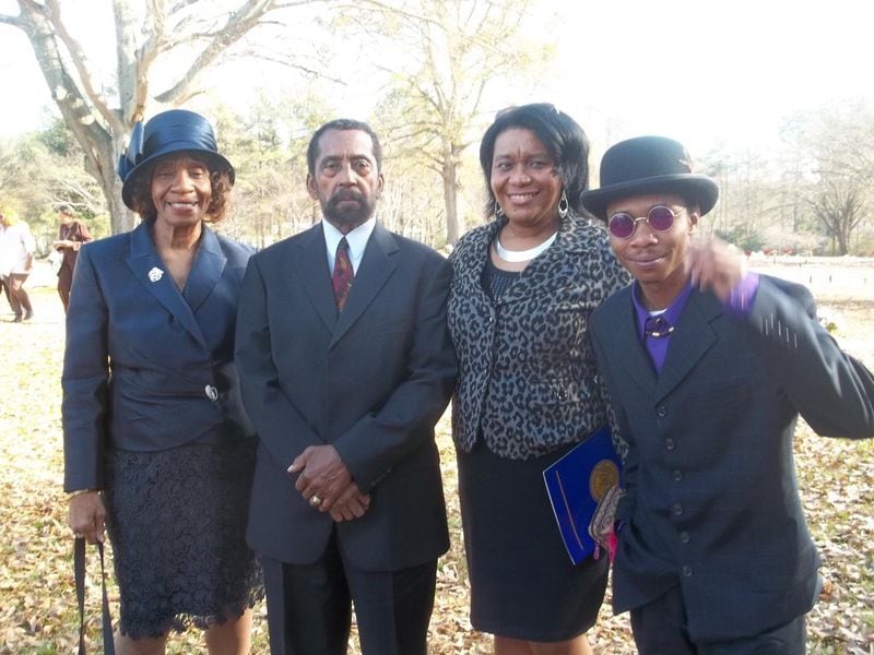 Helen Baynes (far left) and members of her family around 2012 at Carver, where many of their family members are buried.