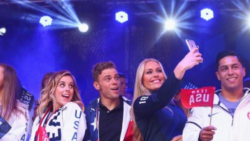 Figure skater Ashley Wagner, skier Gus Kenworthy and skier Lindsey Vonn took a selfie during the 100 Days Out 2018 PyeongChang Winter Olympics Celebration in November.