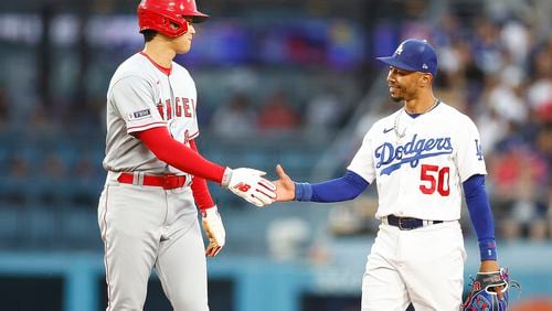 Mookie Betts #50 of the Los Angeles Dodgers and Shohei Ohtani #17 of the Los Angeles Angels in the fourth inning at Dodger Stadium on July 7, 2023, in Los Angeles, California. (Ronald Martinez/Getty Images/TNS)