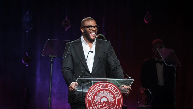 Actor and producer Tyler Perry talks to a large crowd gathered for the Candle In The Dark Gala, celebrating the 150th anniversary of Morehouse College in Atlanta Ga February 18, 2017. Perry was awarded the Bennie and Candle award during the gala. STEVE SCHAEFER / SPECIAL TO THE AJC