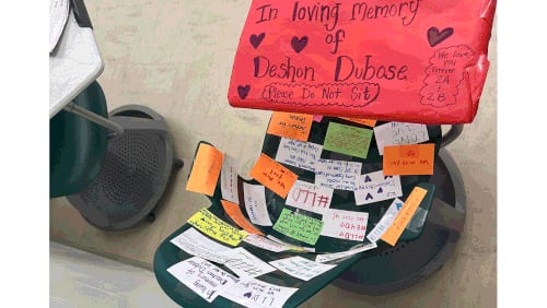 The desk of Deshon DuBose was covered with notes by fellow students. / Courtesy of Laurin McClung