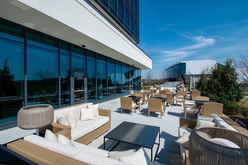 The patio at Apron overlooks the track at the Porsche Experience Center. HENRI HOLLIS