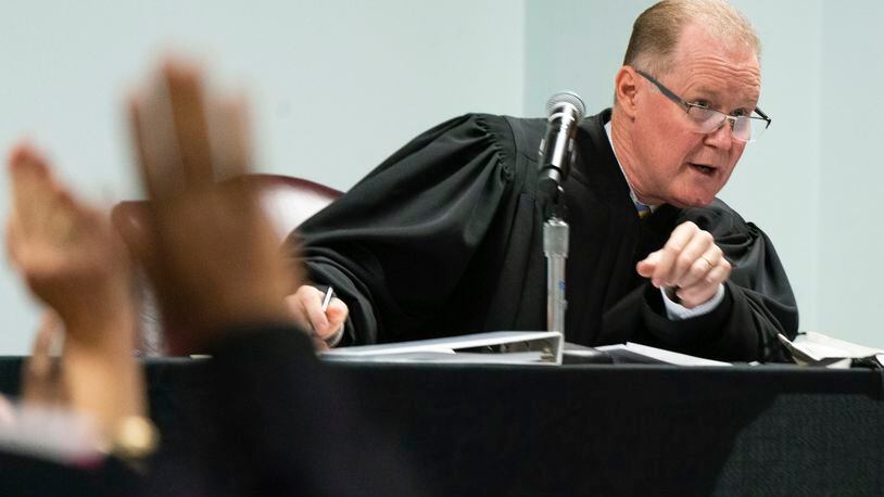 Judge Timothy Walmsley questions potential jurors Tuesday morning during jury selection in the trial of the men charged with killing Ahmaud Arbery. (Elijah Nouvelage/Pool Photo via AP)