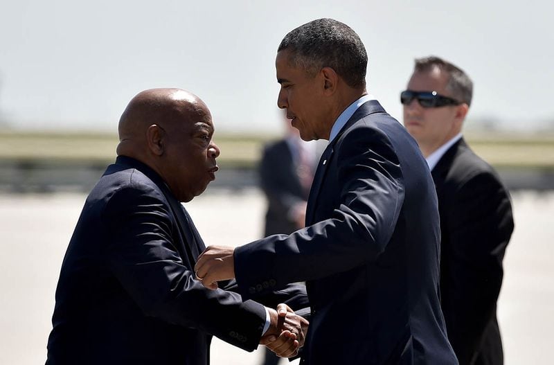MARCH 29, 2016: President Obama, greeted here by U.S. Rep. John Lewis, came to Atlanta to speak at the National Rx Drug Abuse & Heroin Summit. (BRANT SANDERLIN / bsanderlin@ajc.com)