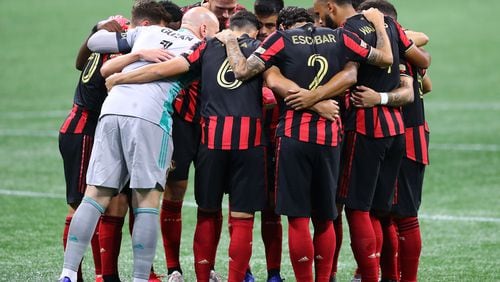 082220 Atlanta: Atlanta United players huddle up as they take the field to play Nashville SC in a MLS soccer match on Saturday, August 22, 2020 in Atlanta.    Curtis Compton ccompton@ajc.com 