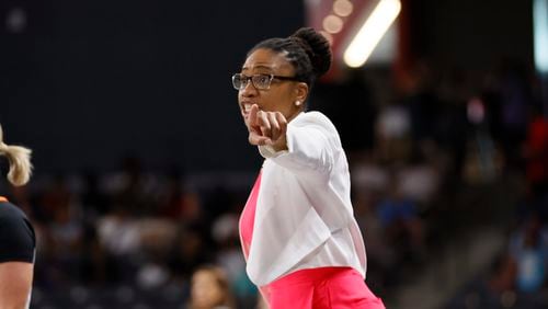 Atlanta Dream head coach Tanisha Wright yields instructions to her team during the first half as the team faces the Connecticut Sun at Getaway Arena on Sunday, June 11, 2023, in College Park. Miguel Martinez / miguel.martinezjimenez@ajc.com 