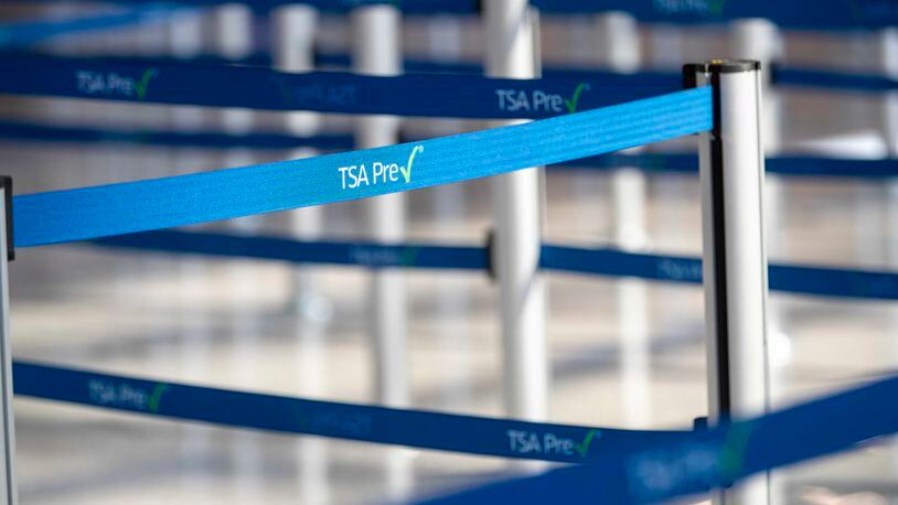 A TSA PreCheck retractable belt barrier is displayed at the new South checkpoint security screening in the domestic terminal at the airport in Atlanta, Monday, November 23, 2020.  (Alyssa Pointer / Alyssa.Pointer@ajc.com)