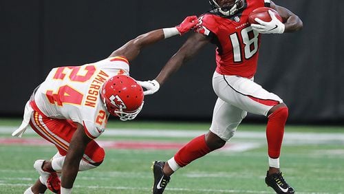 Falcons first-round draft pick, wide receiver Calvin Ridley, eludes Chiefs cornerback David Amerson for yardage on the opening kickoff Friday, Aug. 17, 2018, at Mercedes-Benz Stadium in Atlanta.