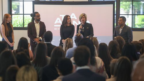 Metro Atlanta Chamber President & CEO Katie Kirkpatrick, second from right, speaks during the unveiling of the new marketing campaign, “Where You Belong,” at the St. Regis Hotel, Monday, April 22, 2024, in Atlanta. (Jason Getz / AJC)
