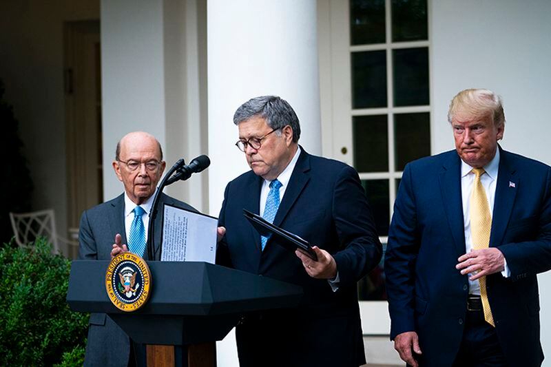 From left, Commerce Secretary Wilbur Ross, Attorney General William Barr and President Donald Trump before making a statement about the census on July 11 in the White House Rose Garden.