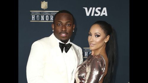 In this Feb. 4, 2017, file photo, LeSean McCoy of the Buffalo Bills, left, and Delicia Cordon arrive at the 6th annual NFL Honors at the Wortham Center in Houston. Lawyers for LeSean McCoy have asked a Ga. judgeto throw out a lawsuit filed by his former girlfriend that accuses him of failing to protect her from a violent home invasion that left her bloodied, beaten and had $133,000 worth of jewelry stolen by an intruder at a home McCoy owns in Milton.