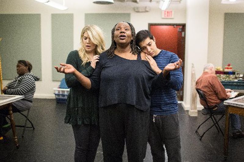 Fiances Caroline Freedlund (left) and Nick Arapoglou (right) rehearse a scene with "Gifts of the Magi" co-star Bernardine Mitchell at Theatrical Outfit. CONTRIBUTED BY BRANDEN CAMP