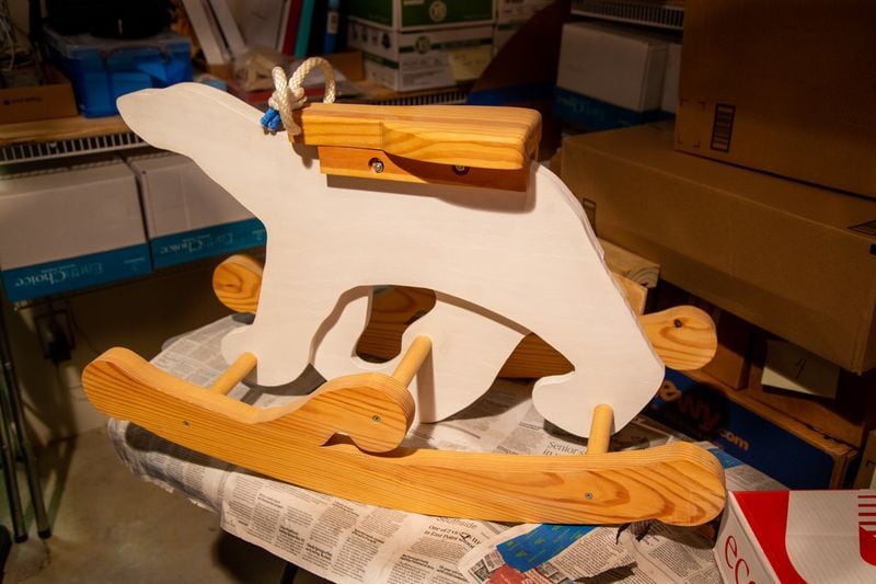 One of Dr Jon Saulson's favorite woodworking creations is this Polar Bear rocker. When Saulson retired as an educator he got into woodworking making toys, puzzles games, figurines and art out of wood.  PHIL SKINNER FOR THE ATLANTA JOURNAL-CONSTITUTION.